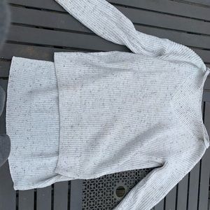 White sweater with a slit on both sides